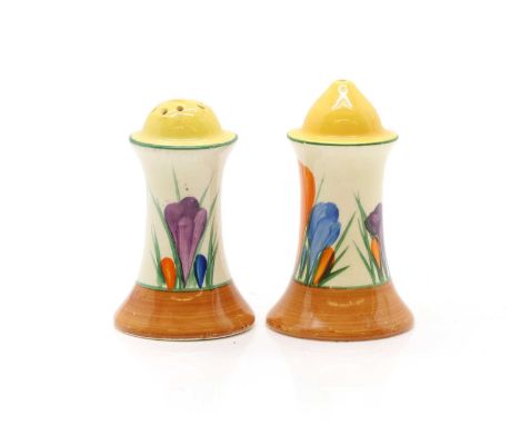 A pair of Clarice Cliff pottery 'Crocus' pattern cruets c.1930, each of waisted form, printed marks,9cm high (2)Condition Rep