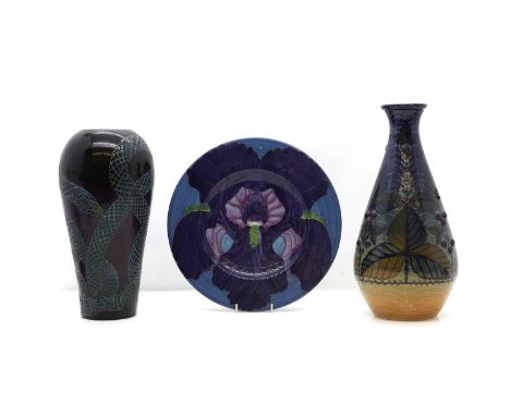Three Dennis China works pottery pieces, by Sally Tuffin, to include pottery charger, decorated with an iris tube lined decor