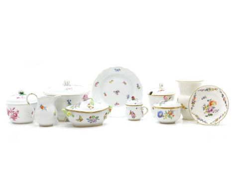 A group of Meissen porcelain 20th century, comprising three jars and covers, the largest 17cm diameter, a plate, 19.5cm diame