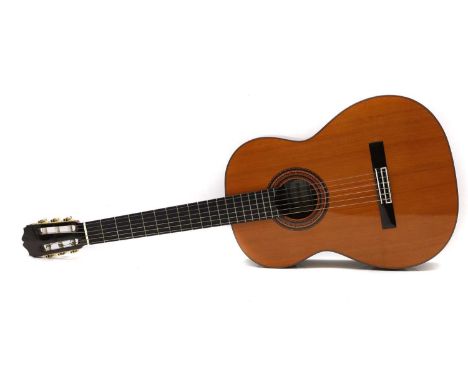 An Asturias classical guitar,  Model no. 3349, serial number 04668, with inlaid cedar top, mahogany neck and Indian rosewood 