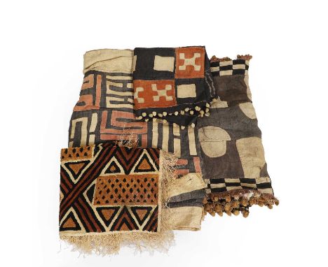 A group of four African textiles, 20th century, likely Kuba or Bakuba, present-day Democratic Republic of the Congo, all wove