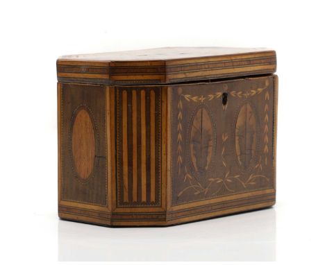 A George III inlaid mahogany tea caddy, c.1790, with canted corners, enclosing lidded compartments, 19cm wide11.5cm deep12.5c
