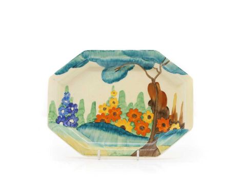 A Clarice Cliff pottery 'Sandon' pattern sandwich plate c.1930, of octagonal form, painted with a stylised tree before flower