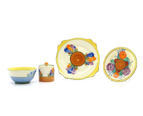 A collection of Clarice Cliff pottery items c.1930, comprising a 'Blue Crocus' bowl, printed marks, 14cm diameter, 6.8cm high