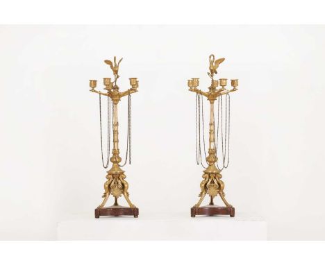A pair of Napoleon III Empire-style gilt-bronze and marble candelabra, second half of the 19th century, French, each with a P
