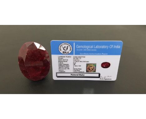 LARGE CERTIFIED LOOSE NATURAL RUBYthe oval cut ruby weighing 401cts, with GLI Gemstone Authentication Report 