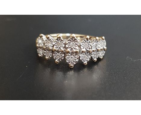 DIAMOND SET RINGthe illusion set diamonds in stepped setting, on nine carat gold shank, ring size M and approximately 2.8 gra