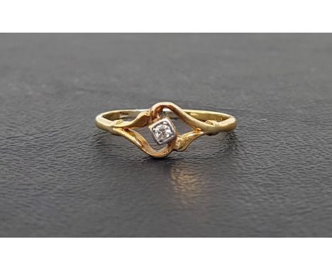 DIAMOND SOLITAIRE RINGthe small round cut diamond approximately 0.04cts, on eighteen carat gold shank with pierced setting, r