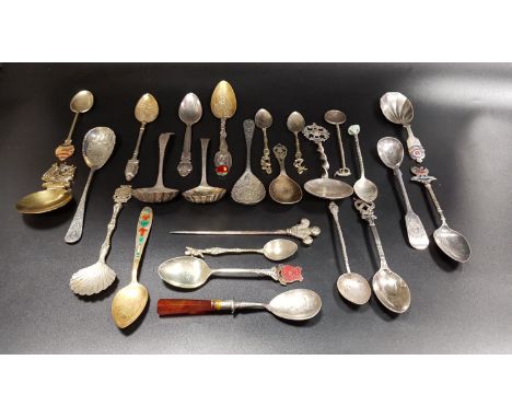 SELECTION OF SILVER PLATED AND OTHER SPOONSincluding two sugar sifting spoons; various souvenir and enamel finial spoons to i