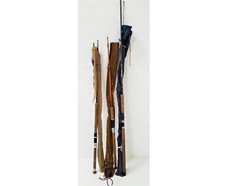 THREE SPINNING RODScomprising Shakespeare carbon 2.7m, black arrow and 7ft 6" split cane fishing rod 