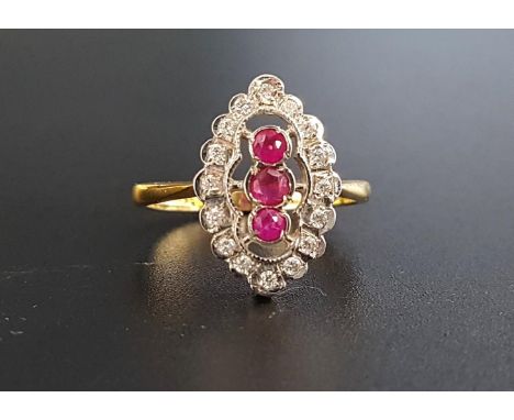 RUBY AND DIAMOND PLAQUE RINGthe central three rubies in vertical setting totaling approximately 0.25cts, in sixteen diamond s