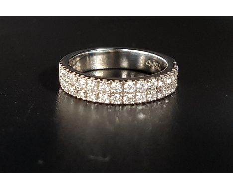 DIAMOND TWO ROW HALF ETERNITY RINGthe diamonds totaling approximately 0.65cts, in eighteen carat white gold, ring size M 