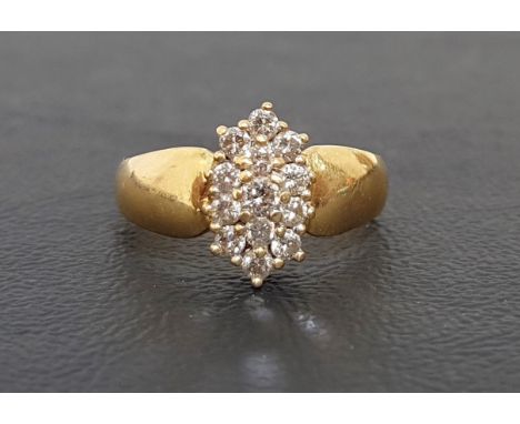 DIAMOND CLUSTER RINGthe multi diamonds totaling approximately 0.5cts, on eighteen carat gold shank, ring size M-N and approxi