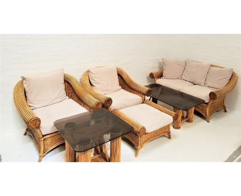 INDONESIAN BAMBOO CONSERVATORY SUITEcomprising a curved back two seat sofa, pair of curved back armchairs and a footstool all