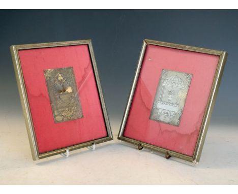 Pair of engraved white metal rectangular plaques, each decorated with a classical architectural window, framed and glazed   C