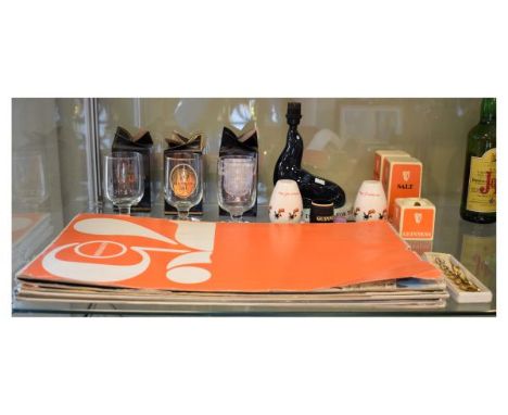 Collection of Guinness promotional items including; Seal table lamp, condiments, calendars, glasses, buttons etc   Condition: