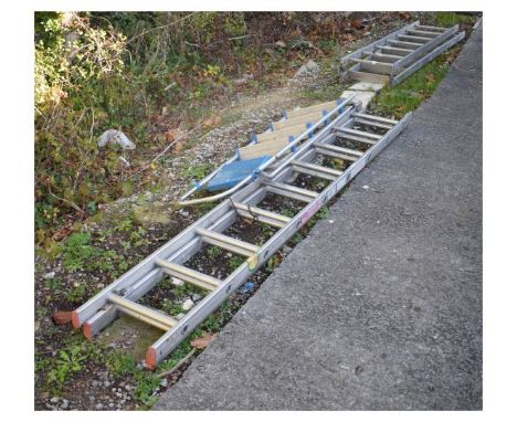 Three assorted aluminium ladders comprising: two piece sliding ladder of eighteen rungs total, folding ladder of fourteen run