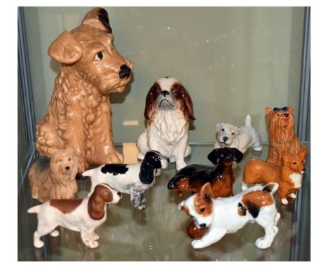 Collection of ceramic dog ornaments including; Royal Doulton Character Dog with ball HN.1103, Sylvac Terrier No.1379 and King