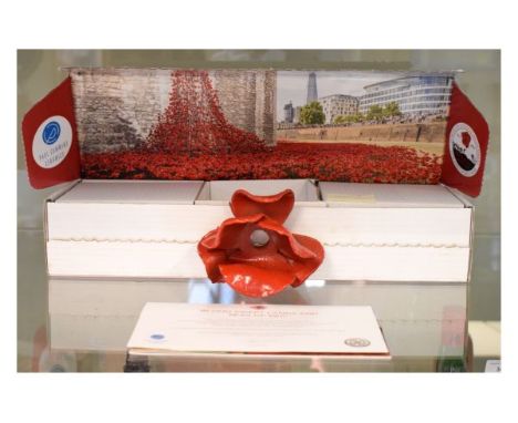 Paul Cummins and Tom Piper - Ceramic poppy from the art installation 'Blood Sweat Lands And Seas Of Red' shown at the Tower o