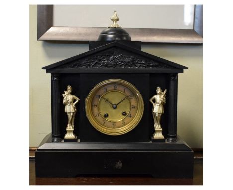 Late 19th Century black slate cased architectural style mantel clock, brass movement striking on a gong   Condition: 
