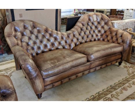 SOFA, 227cm W x 108cm H, from Fleming Howland, in buttoned brown leather. 