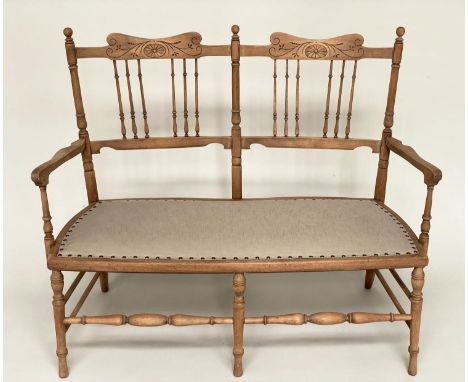 HALL BENCH, early 20th century Edwardian, carved fruitwood, with turned spindle back and brass studded linen upholstered seat