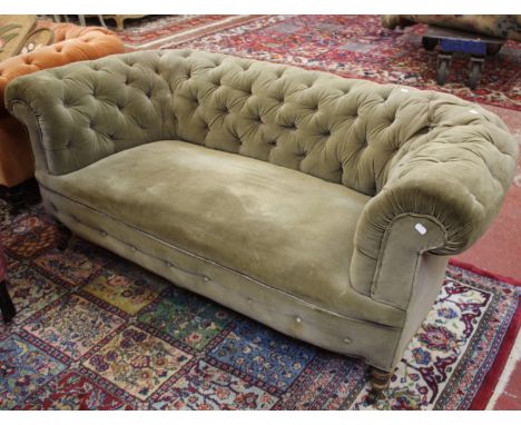 A Victorian green chesterfield sofa 173cm wide 