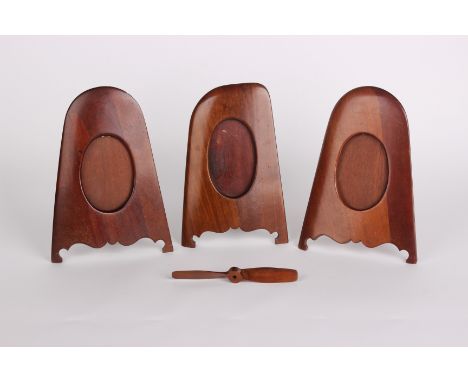 A pair of photograph frames constructed from a Ist World War aircraft propellor and a similar item