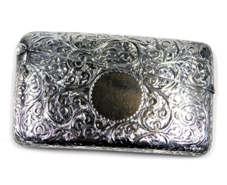 A George V silver card case, of shaped design with engine engraved foliate scrolls and a vacant circular cartouche, Birmingha