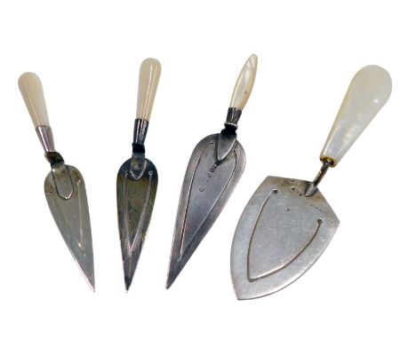 Four silver bookmarks, each of trowel form with mother of pearl and hardstone handles.