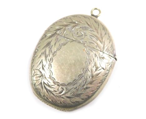 A silver plated oval shaped match case, with engine engraved decoration and match strike to base, 5cm high. 