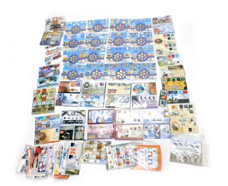 A large quantity of coin covers, to include a number of Euro 2002, various countries, first day covers, etc.