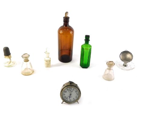 Miscellaneous items, to include a brown chemist bottle, smaller green example, a West Clox Baby Ben alarm clock, an early 20t