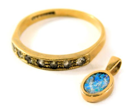 Two items of jewellery, comprising a crushed opal set pendant in yellow metal stamped 585, and a 9ct gold half hoop eternity 