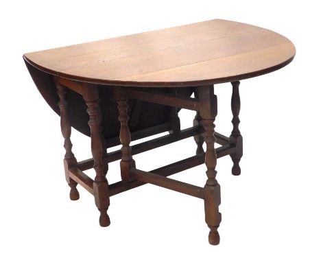 An 18thC oak gate leg table, with turned legs and square framing, 104cm x 135cm fully open. 