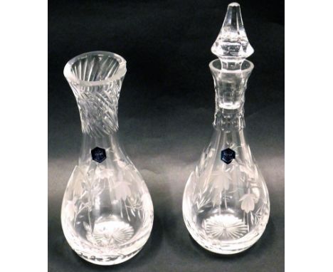 A Stewart Crystal decanter and stopper, decorated with fuchsia, 25cm high, and a vase, both boxed. 