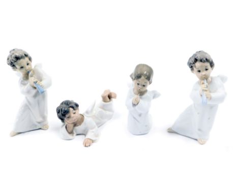 Four Lladro porcelain figures modelled as angels, in various poses, two playing a wind instrument, one lying down and the oth