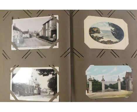 An album of early 20thC postcards, to include scenes around London, Belgian First World War silk, coastal towns to include Gr