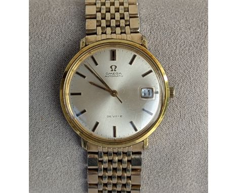 A 1960s Omega De Ville gents stainless steel cased automatic wristwatch, the silver dial with date aperture, seconds sweep an