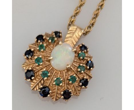 An oval opal and gem-set pendant on a 14ct yellow gold setting, 25mm diameter, 5.7g on a 9ct gold fancy-link chain, 5.3g, all