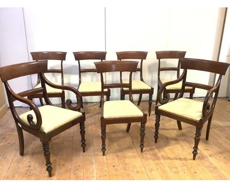 A set of seven George IV mahogany dining chairs, including a pair of elbow chairs with bugle-shaped arms (7) 90cm by 50cm by 