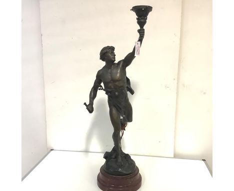 After Emile Louis Picault (1833-1915), Victoria, a bronzed metal figural lamp, on a rouge marble base, the left arm holding a