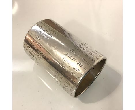 A large Royal Navy Service Record silver napkin ring, hallmarked for London 1900, with retailer's stamp, S. Lanyon, 4 Ordnanc