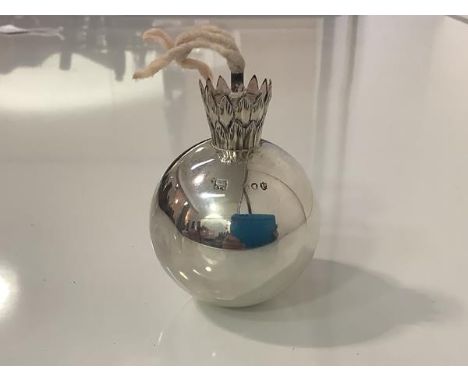 A Victorian silver table lighter, Sampson Mordan &amp; Co., London 1890, of grenade form (a few dents). Height 6.75cm