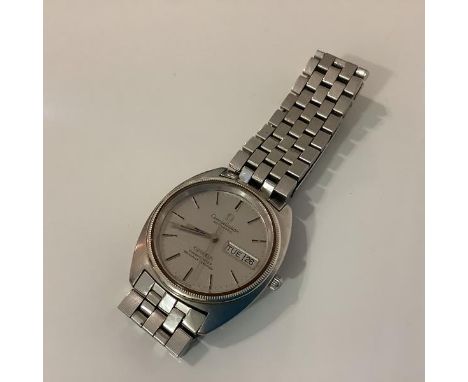 Omega: a stainless steel day/date centre seconds Constellation wristwatch, the silvered dial further inscribed Chronometer Of