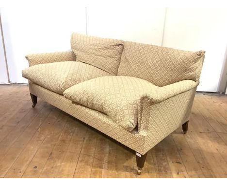 A Whytock &amp; Reid of Edinburgh two seater sofa, the integral back cushions, arms and seat upholstered in ticking with manu