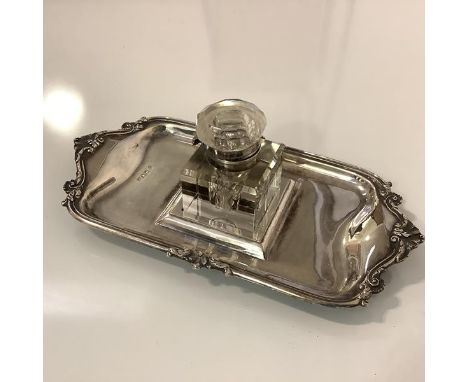 An Edwardian silver inkstand, Josiah Williams &amp; Co., London 1906, the square glass well (possibly associated) with silver