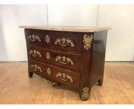 A Louis XVI kingwood and brass mounted commode, the associated marble top above an arrangement of cross-banded drawers over a