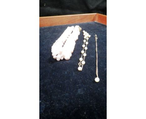 A collection of pearl-set jewellery including a cultured pearl pink tone choker necklace