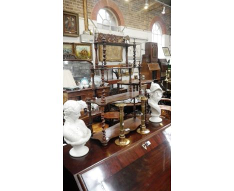 A Victorian rosewood wall shelf with spiral supports